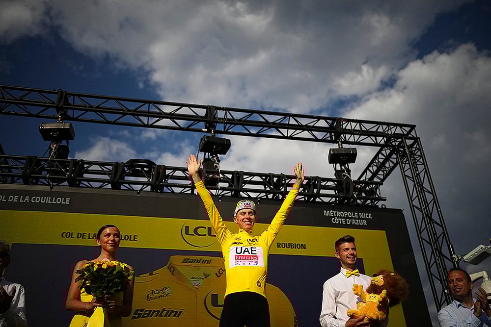 | Photo: AP/Daniel Cole : Twentieth stage winner Slovenia's Tadej Pogacar